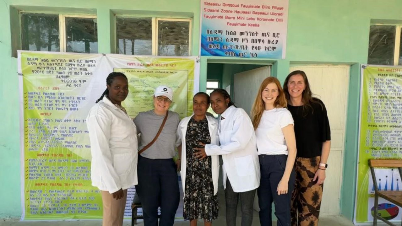 Rachel Engel (centre) with community health workers, local Ethiopian Government officials and team members from Last Mile Health