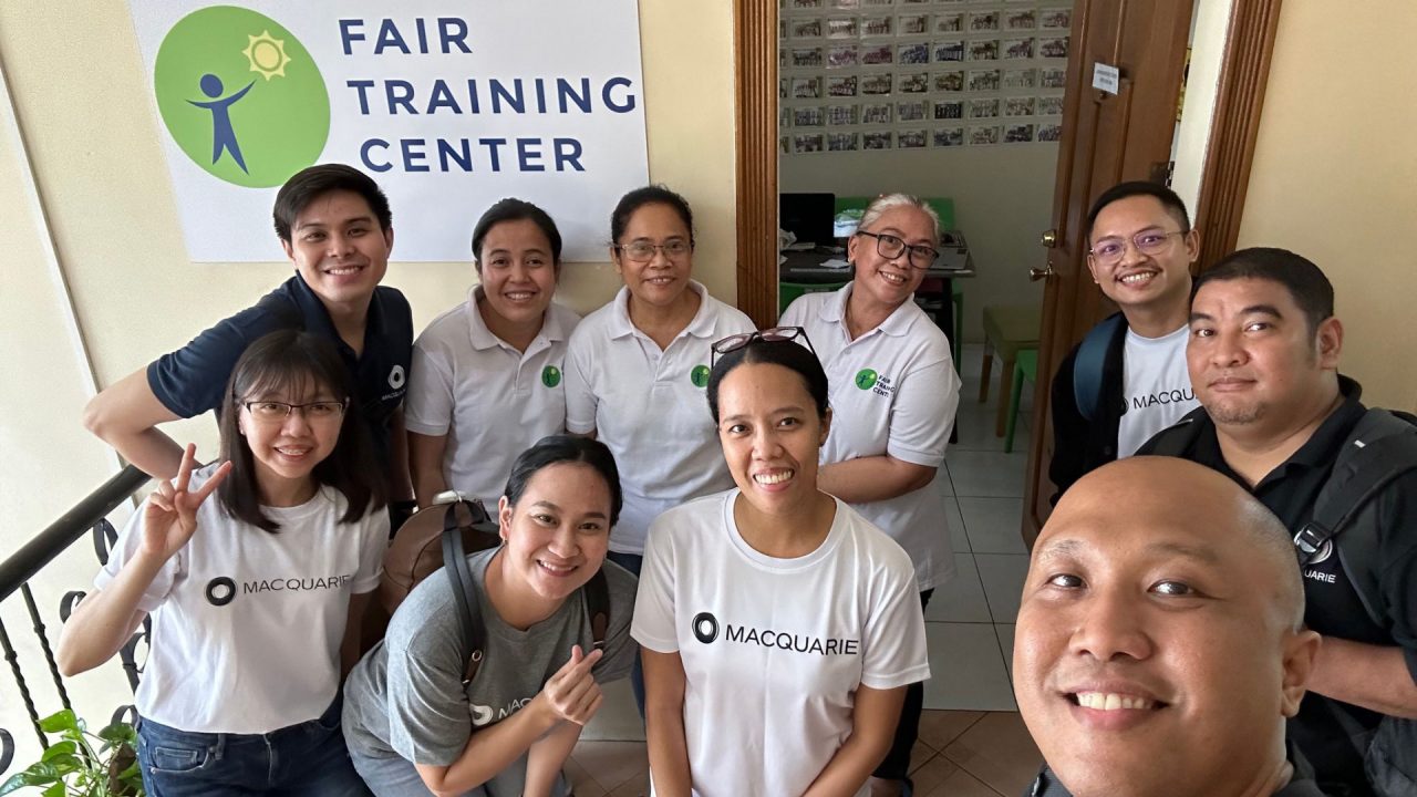 Camille Andrada (first from the left, front row) volunteering at the Fair Training Center in Manila. 