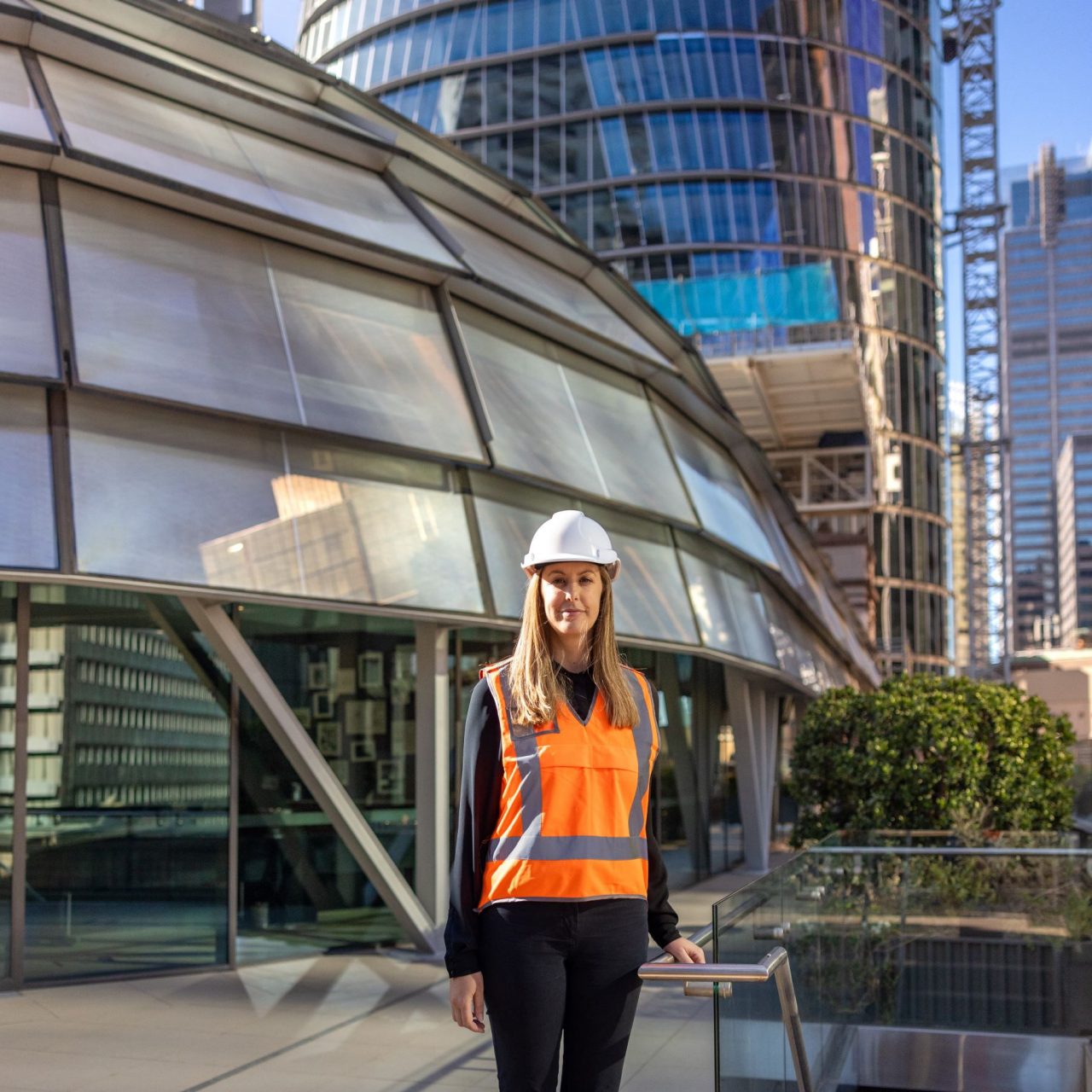 Kate on the rooftop terrace of 50 Martin Place, Macquarie’s current global headquarters which is connected to 1 Elizabeth, which can be seen behind her and is due to open in 2024.