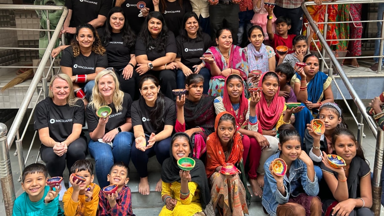 Macquarie teams in India participating in a Diya making volunteering event with migrant communities, supported by Jan Sahas, a Macquarie Group Foundation grant partner.