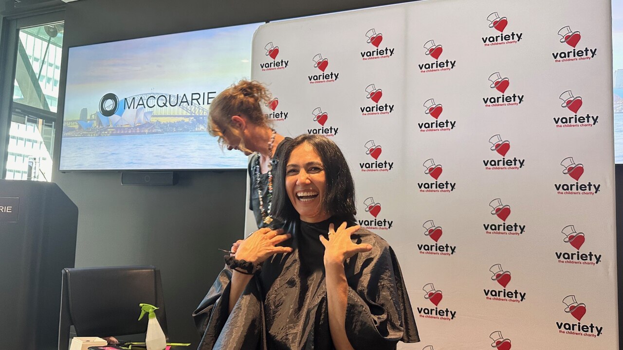 Sindy Galindo, Associate Director, Risk Management Group and Lina Tchung, Division Director, Risk Management Group (not pictured) cut their hair to raise funds for Variety – The Children’s Charity 